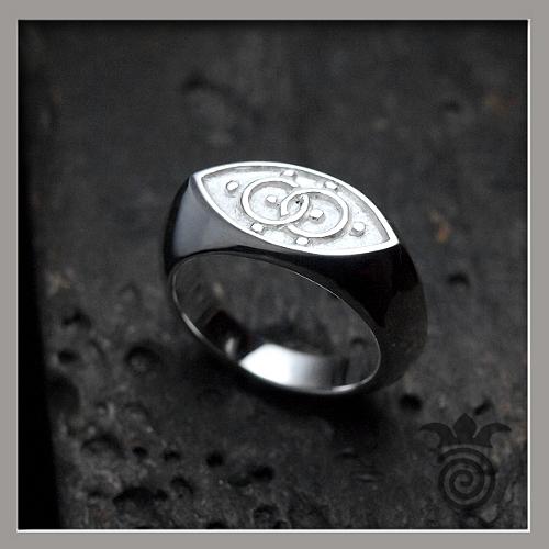 Bague argent et symbole